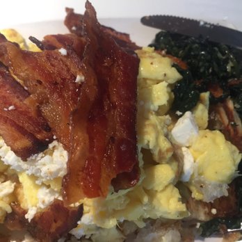 Departure Lounge - Croissant with eggs, bacon, feta, and spinach - Airport Lounges Near Me - Austin, Texas Departure Lounge - Croissant with eggs, bacon, feta, and spinach - Airport Lounges Near Me - Austin, Texas
