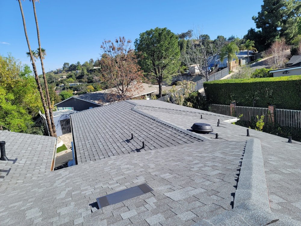 Slide of Pacific Roofers