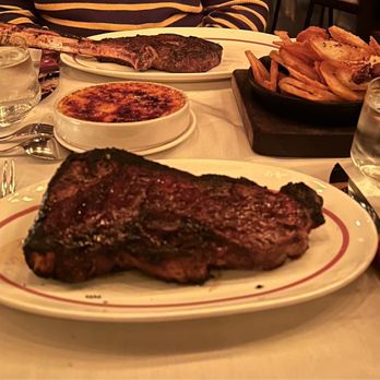 Quality Meats - Bone-in dry-aged prime sirloin, dry-aged prime tomahawk, pan roasted potatoes, corn crème brulee - Steakhouses Near Me - New York, New York