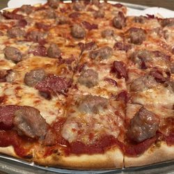 Pizza Villa - Pepperoni and sausage pizza