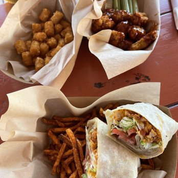 Roadrunner Restaurant & Saloon - Crispy Chicken Wrap w/ sweet potato fries, boneless wings w/ tater tots - American Near Me - New River, Arizona
