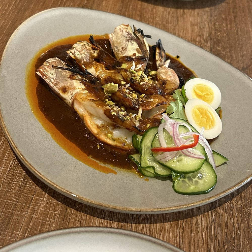 Prik Hom - Shrimp Gor Lae - delicious appetizer of grilled shrimp/curry with quail egg and cucumber ajad - Thai Near Me - San Francisco, California Prik Hom - Shrimp Gor Lae - delicious appetizer of grilled shrimp/curry with quail egg and cucumber ajad - Thai Near Me - San Francisco, California