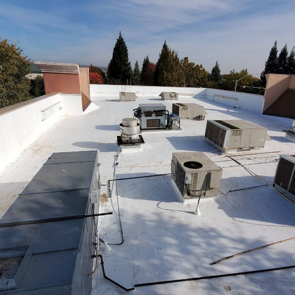 Slide of Caruzo's Roofing Contractors