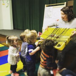 Ballard Preschool Co-op - Infant Class sensory exploration with Teacher Becca.