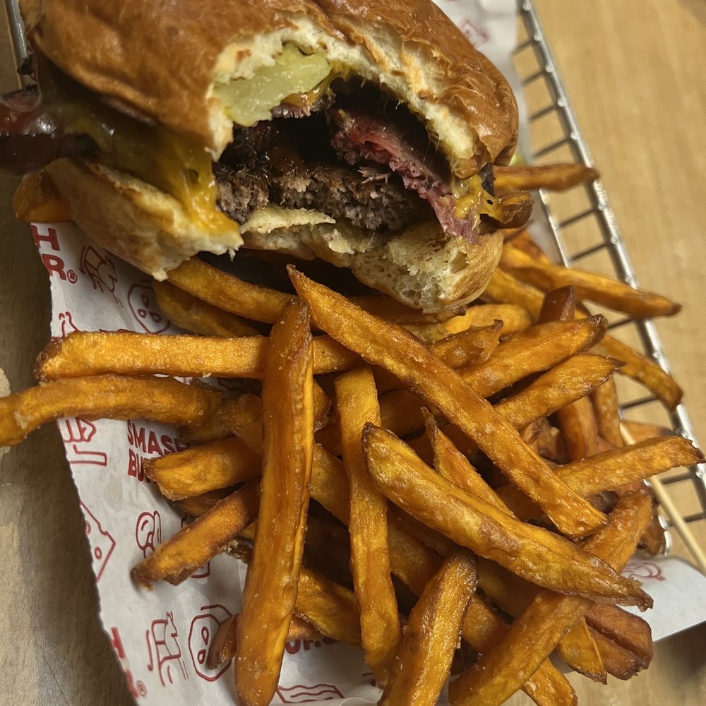 a basket of fries and a burger a basket of fries and a burger