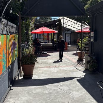 Café Little Deer - Entrance archway: Path off the street, courtyard opens up beyond - Cafes Near Me - Santa Rosa, California Café Little Deer - Entrance archway: Path off the street, courtyard opens up beyond - Cafes Near Me - Santa Rosa, California
