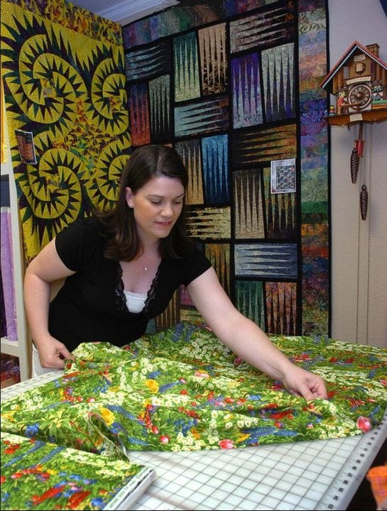 The Stitching Depot Quilt Shop Logo