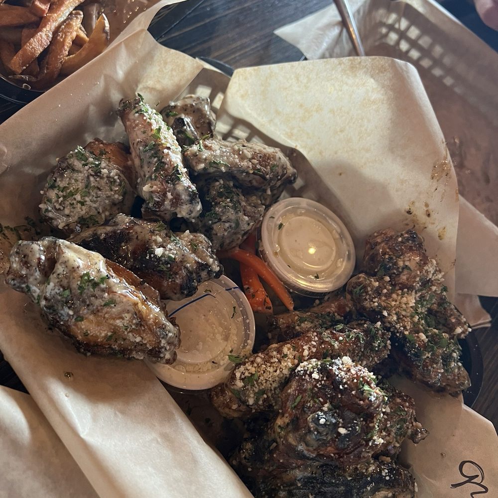 Everett's - House Brined Wings - garlic parm (left) bubba (Buffalo garlic parm) (right) - American Near Me - Omaha, Nebraska
