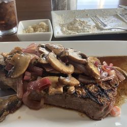 HM’s Steakhouse - 12oz Boneless Ribeye with sautéed mushrooms and red onions and horse radish and sourcream