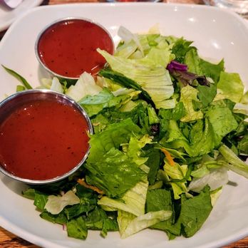 Archie’s Tavern - Side dinner salad with only the greens and raspberry vinaigrette - Sports Bars Near Me - Livonia, Michigan Archie’s Tavern - Side dinner salad with only the greens and raspberry vinaigrette - Sports Bars Near Me - Livonia, Michigan