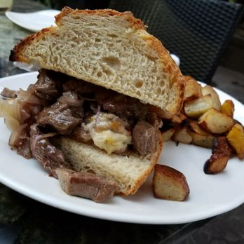FERRO - Savory beef sandwich with side potatoes.  Delicious sauce! - Pizza Near Me - Idyllwild, California
