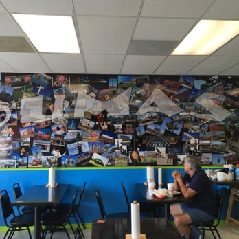 Dumass Taco Co 2 - a man sitting at a table - Tacos Near Me - Tomball, Texas