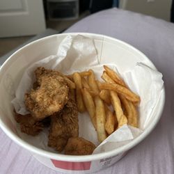 KFC - What I got...This is there "amazing" strips and fries bucket. Boneless Bucket for One bs.