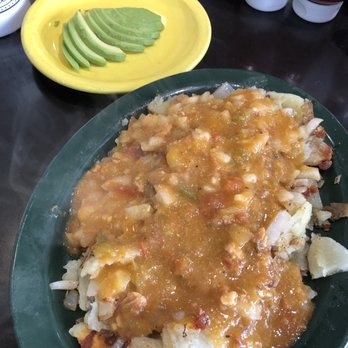 Sam's No 3 - Home fries with Kickin ' Pork Green Chili and avocado - Breakfast & Brunch Near Me - Denver, Colorado Sam's No 3 - Home fries with Kickin ' Pork Green Chili and avocado - Breakfast & Brunch Near Me - Denver, Colorado