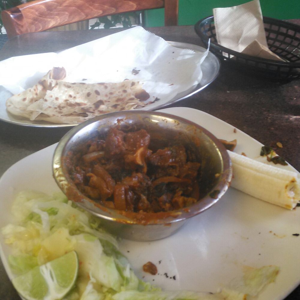 Darbo’s - Goat curry and chapati Somali flat bread delicious - African Near Me - Columbus, Ohio