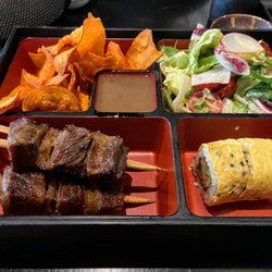Kai Sushi - Beef short rib Bento box. 48hr slow-cooked ribs and demi glace sauce, served with green salad, sweet potato chips, and Kaburimaki.