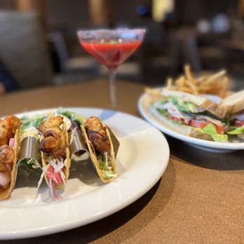 Bazille at Nordstrom - two plates of food on a table - New American Near Me - Tampa, Florida Bazille at Nordstrom - two plates of food on a table - New American Near Me - Tampa, Florida
