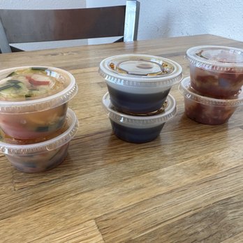 Asian Pear - Cucumber salad (left); teriyaki sauce (middle); and kimchi (right). - Korean Near Me - Albuquerque, New Mexico