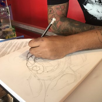 Wizz Tattoo - Rafy drawing out the tat - Tattoo Near Me - Carolina, Puerto Rico Wizz Tattoo - Rafy drawing out the tat - Tattoo Near Me - Carolina, Puerto Rico