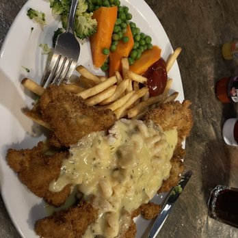 Mission Station Grill - Neptune Schnitzel with Crispy Fries and Sautéed Vegetables - Canadian (New) Near Me - Mission, British Columbia Mission Station Grill - Neptune Schnitzel with Crispy Fries and Sautéed Vegetables - Canadian (New) Near Me - Mission, British Columbia