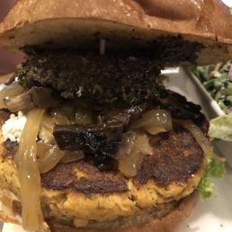 Badger Badger Mushroom Mushroom handheld with Salmon burger. Badger Badger Mushroom Mushroom handheld with Salmon burger.