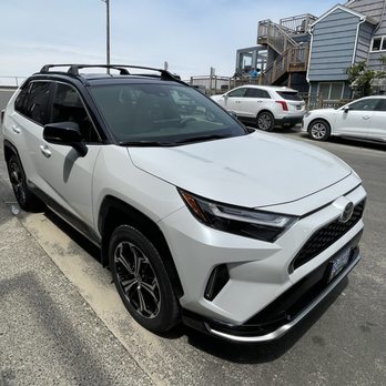 Hi Tide Oceanfront Inn - The electric KIA I rented and now I want one! So quiet, comfortable and easy to drive! - Hotels Near Me - Seaside, Oregon