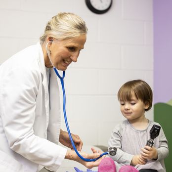 Ebert Family Clinic - Dr. Chris introduces a patient to some tools of the trade. - Pediatricians Near Me - Frisco, Colorado Ebert Family Clinic - Dr. Chris introduces a patient to some tools of the trade. - Pediatricians Near Me - Frisco, Colorado