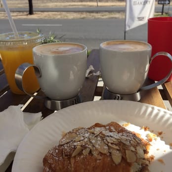 French Corner - La lattes and almond croissant while we wait for our crepes - Bakeries Near Me - Encinitas, California