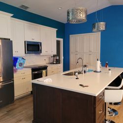 R&R Professional Painting and Waterproofing - Ray was very helpful in making my color selection easy.  Ray provided a color swatch book to help the ideal color scheme.