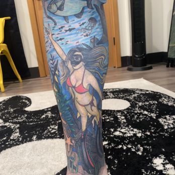 Sugar Gecko Aesthetics - Male leg sugaring service over some fun tattoos. - Skin Care Near Me - Renton, Washington Sugar Gecko Aesthetics - Male leg sugaring service over some fun tattoos. - Skin Care Near Me - Renton, Washington