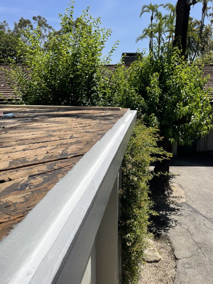 Slide of New Village Roofing