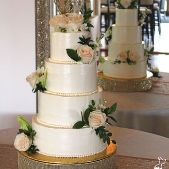 Icings by Linda - a wedding cake on a table - Cupcakes Near Me - Hadley, Pennsylvania Icings by Linda - a wedding cake on a table - Cupcakes Near Me - Hadley, Pennsylvania