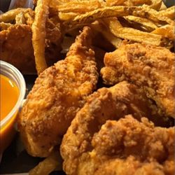 The Stadium Smokehouse Bar and Grill - Chicken strips and fries