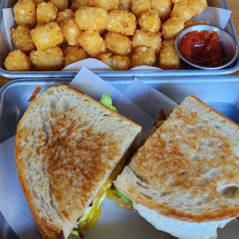 Get Toasted - Breakfast sandwich w/ over easy egg and tater tots. My fav - Breakfast & Brunch Near Me - Riverbank, California Get Toasted - Breakfast sandwich w/ over easy egg and tater tots. My fav - Breakfast & Brunch Near Me - Riverbank, California