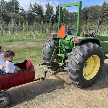 Aamodt's Apple Farm - Kids riding the truck around the famr - Fruits & Veggies Near Me - Stillwater, Minnesota Aamodt's Apple Farm - Kids riding the truck around the famr - Fruits & Veggies Near Me - Stillwater, Minnesota