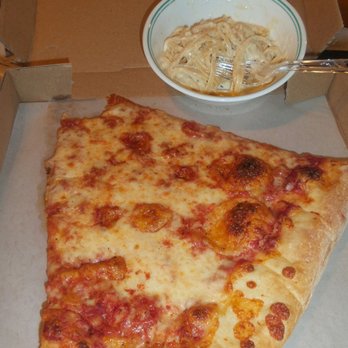 Bear Canyon Pizza - The huge slice and half order of pasta. No knots in this pic because they were eaten while I re-heated the delicious pasta! - Pizza Near Me - Tucson, Arizona Bear Canyon Pizza - The huge slice and half order of pasta. No knots in this pic because they were eaten while I re-heated the delicious pasta! - Pizza Near Me - Tucson, Arizona