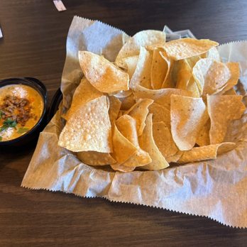 Torchy's Tacos - Queso with chips - Tacos Near Me - Altamonte Springs, Florida Torchy's Tacos - Queso with chips - Tacos Near Me - Altamonte Springs, Florida