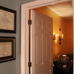 Quality of Life Massage & Wellness - A peak into one of our treatment rooms from the reception area.
