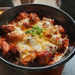 a bowl of food on a table a bowl of food on a table