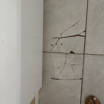 Sandy Shores Vacation Rentals - Broken tile in kitchen - Vacation Rentals Near Me - Madeira Beach, Florida Sandy Shores Vacation Rentals - Broken tile in kitchen - Vacation Rentals Near Me - Madeira Beach, Florida