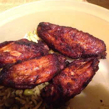 Home Team BBQ - The delicious wings. Ignore the rice, that's a side we made at home to go with our meal. - Barbeque Near Me - Charleston, South Carolina Home Team BBQ - The delicious wings. Ignore the rice, that's a side we made at home to go with our meal. - Barbeque Near Me - Charleston, South Carolina