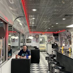 Penny's Diner - Interior (smiling husband )