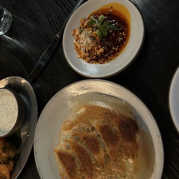 Current Charcoal Grill - Pork and Shiitake dumplings, peanut chili crisp - Asian Fusion Near Me - Birmingham, Alabama Current Charcoal Grill - Pork and Shiitake dumplings, peanut chili crisp - Asian Fusion Near Me - Birmingham, Alabama