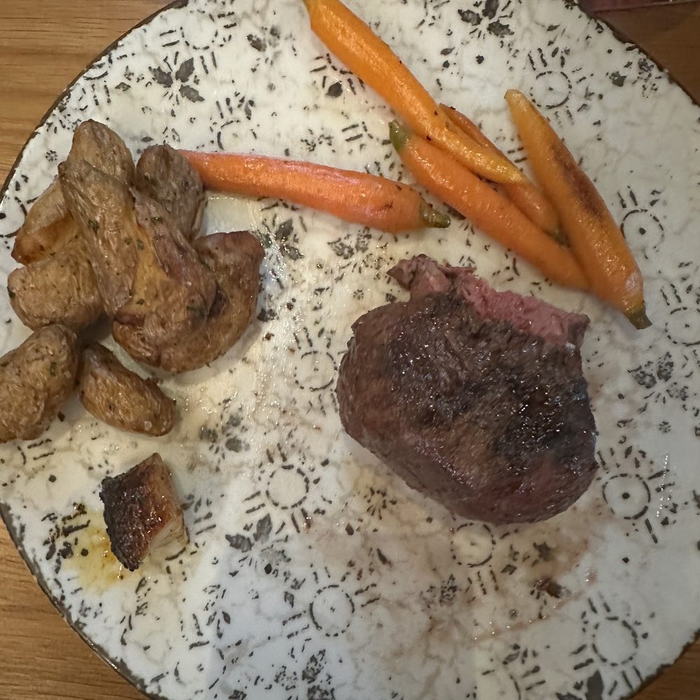 Bigfire - Took picture of filet after I started. It looked better when it arrived. - American Near Me - Orlando, Florida Bigfire - Took picture of filet after I started. It looked better when it arrived. - American Near Me - Orlando, Florida