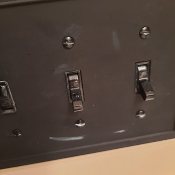 Painter1 of Columbus - Smeared paint spatter on new light switch - Painters Near Me - Columbus, Ohio