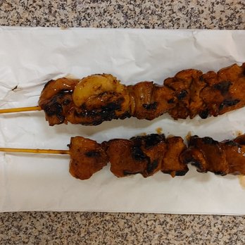 Casa Manila - two skewers of meat on a stick - Filipino Near Me - Toronto, Ontario