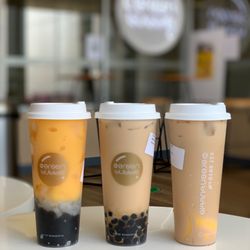 Mr. Green Bubble - Mango peach slush with lychee jelly and boba. Almond milk teasing boba. Honey milk tea with pudding.