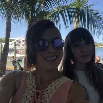 Square Grouper Tiki Bar - Mom and daughter enjoying drinks at Square Grouper - Tiki Bars Near Me - Jupiter, Florida Square Grouper Tiki Bar - Mom and daughter enjoying drinks at Square Grouper - Tiki Bars Near Me - Jupiter, Florida