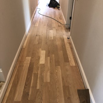 FID Wholesale - a dog laying on the floor - Flooring Near Me FID Wholesale - a dog laying on the floor - Flooring Near Me