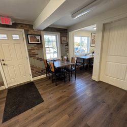 Coletti's Pizza Factory - Entrance, seating and rest room door
